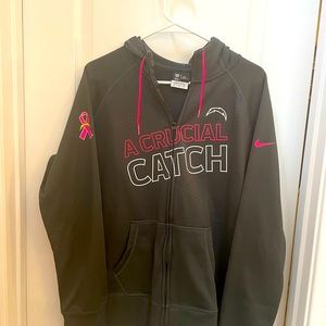 Crucial Catch NFL hoodie.Breast Cancer and Charger emblems. Maybe be worn once.